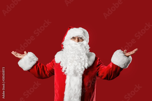 Santa Claus on color backgr...