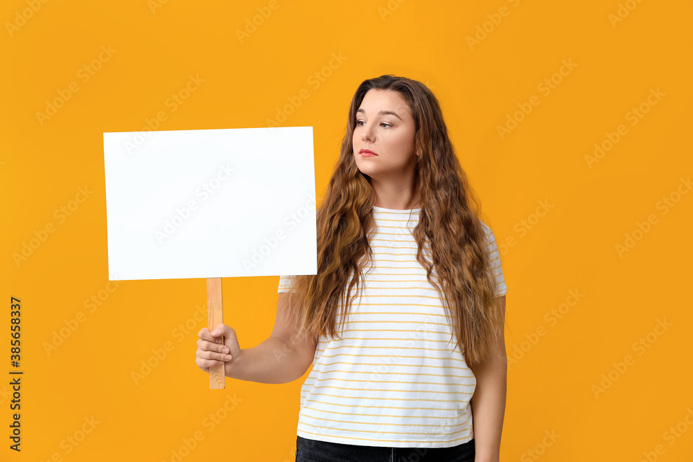 Protesting woman with placard on color background Protesting woman with placard on color background