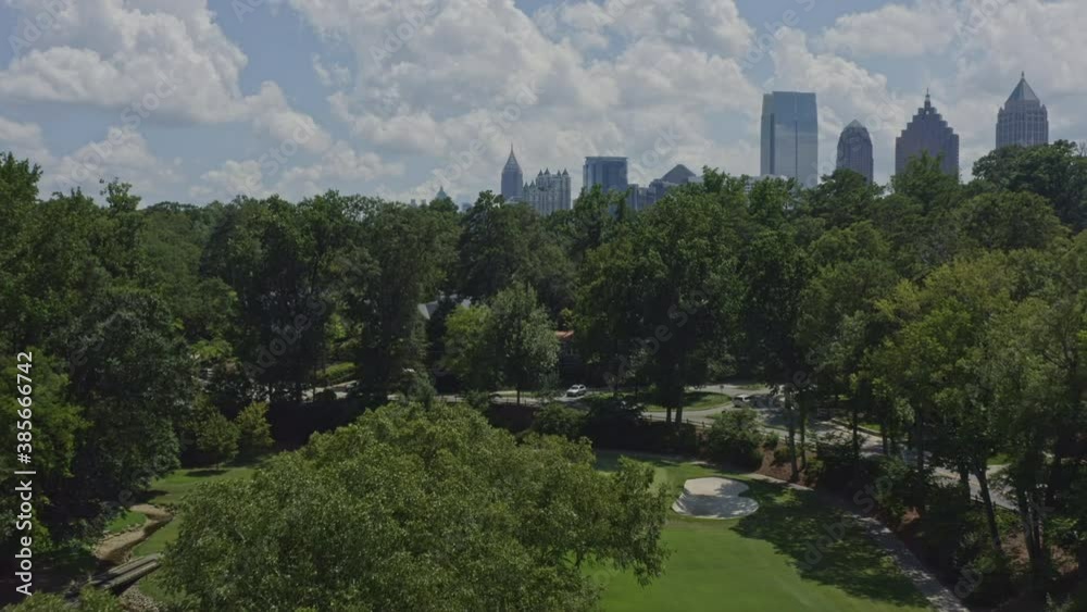 Atlanta Georgia Aerial v606 tilt up shot of Ansley Park, green space and skyline - July 2020 Atlanta Georgia Aerial v606 tilt up shot of Ansley Park, green space and skyline - July 2020