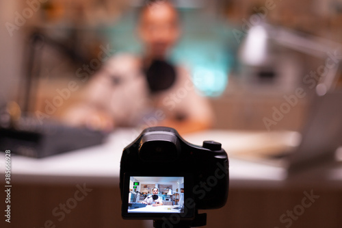 Influencer sitting at vlog station while camera is recording.. Creative online show On-air production internet broadcast host streaming live content, recording digital social media communication