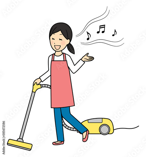 a lady using vacuum cleaner with singing