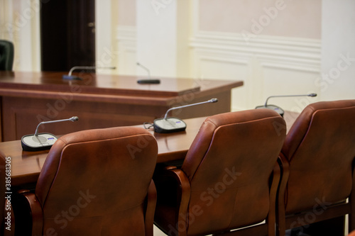 Conference room or seminar meeting room in business event. Session of Government. Academic classroom training course in lecture hall. blur abstract background. working in modern bright office indoor