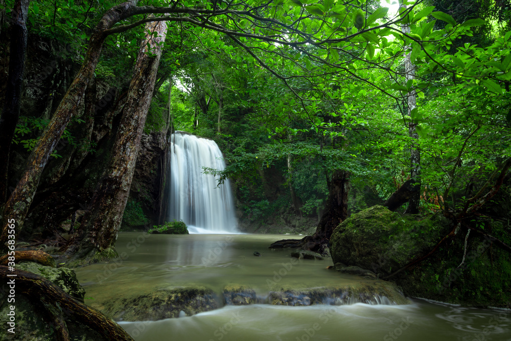 A beautiful waterfall deep in the tropical forest, steep mountain adventure in the rainforest. A beautiful waterfall deep in the tropical forest, steep mountain adventure in the rainforest.