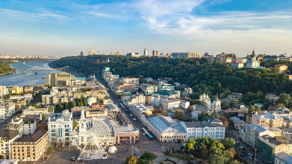Obraz premium Aerial top view of Kyiv cityscape, Dnieper river and Podol historical district skyline from above, city of Kiev, Ukraine 