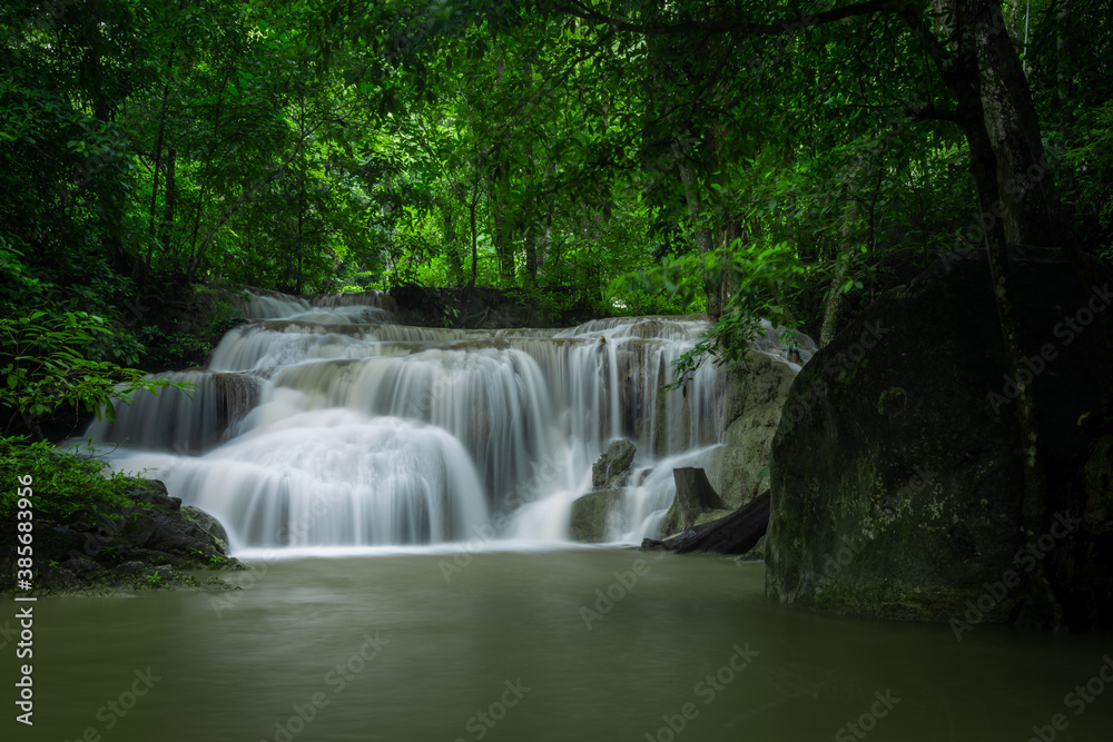 A beautiful waterfall deep in the tropical forest, steep mountain adventure in the rainforest. A beautiful waterfall deep in the tropical forest, steep mountain adventure in the rainforest.