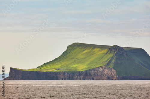 Picturesque green cliffs landscape and atlantic ocean. Faroe islands. Stora Dimun photo