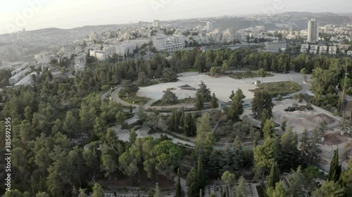 Mount Herzl Cemetery Aerial View
Drone view over Jerusalem,With pine forest, Israel's national cemetery
 photo