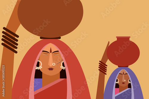 Tablou canvas Traditional Indian women carrying water pots on their heads