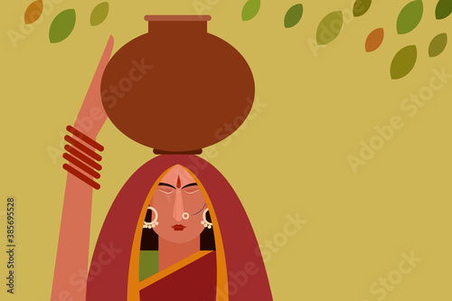 Traditional Indian woman carrying water pots on her head