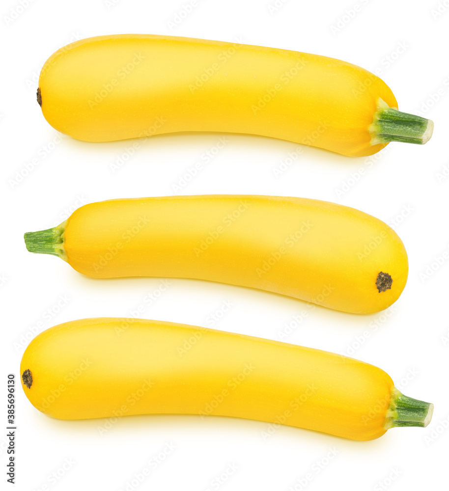 Set of fresh whole yellow vegetable marrow zucchini isolated on a white background.