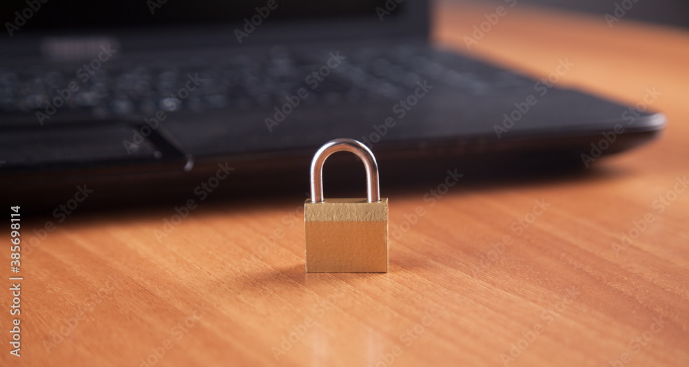 Computer and padlock. Concept of computer security. Computer and padlock. Concept of computer security.