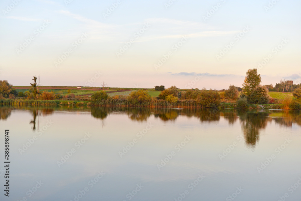 sunset over the river in autumn sunset over the river in autumn