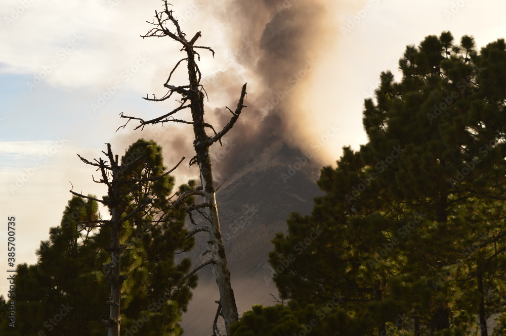 Sunrise hiking on Volcan Acatenango while watching the volcano Fuego erupting in Guatemala Sunrise hiking on Volcan Acatenango while watching the volcano Fuego erupting in Guatemala
