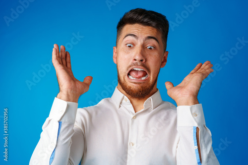 Photos Angry furious hispanic man in rage portrait