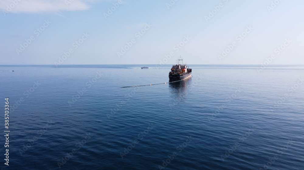A fishing boat near the coast in the Black Sea in Crimea. Fishing for red mullet, horse mackerel, gobies and others