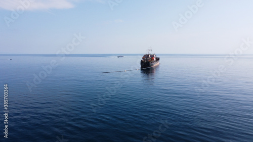 A fishing boat near the coast in the Black Sea in Crimea. Fishing for red mullet, horse mackerel, gobies and others