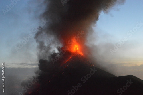 The volcano Fuego erupting with exploding lava, magma and ashes in Guatemala