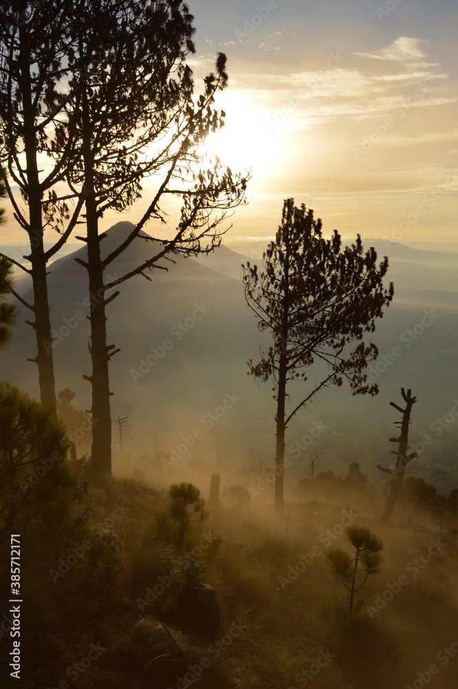 Sunrise hiking and camping on the top of the active Volcan Acatenango while the Volcano Fuego is erupting - Guatemala Sunrise hiking and camping on the top of the active Volcan Acatenango while the Volcano Fuego is erupting - Guatemala