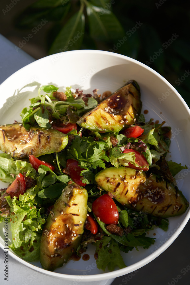 Avocado salad with fresh leaves and vegetable Avocado salad with fresh leaves and vegetable