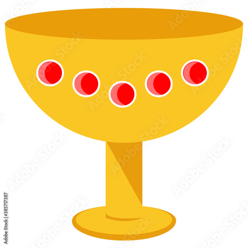 
A gold goblet with precious stones 
