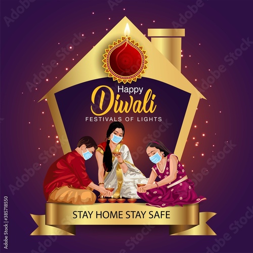 happy diwali greetings. a family making diya decoration with wearing surgical mask. covid corona virus concept