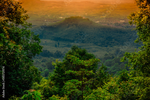 Natural background, high angle from the high mountains that can see the scenery around, the wind blows through the cool, blurred of traveling, the integrity of the moist forest.