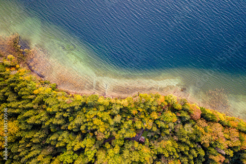 Autum Fall Top view from Drone of Lake Tegernsee and colorful Forest with trees. Lake Shore in bavaria photo