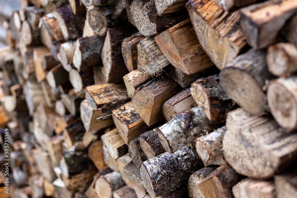 Chopped firewood stacked together. Fuel.