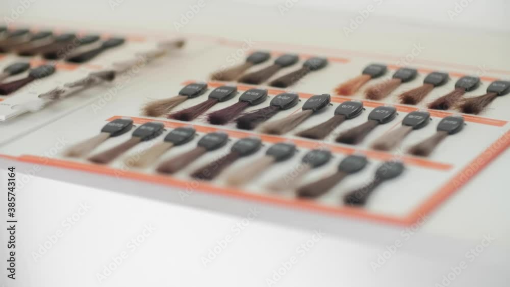 large palette of hair, a choice of colors for dyeing in a beauty salon ...