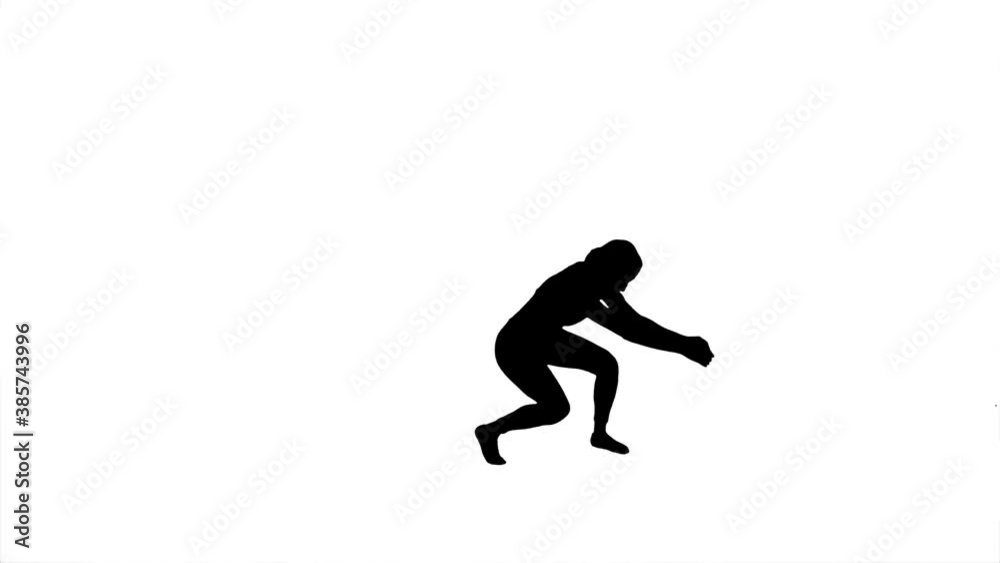 Silhouette. Professional dancer performs a choreographed dance over white background. Silhouette. Professional dancer performs a choreographed dance over white background.