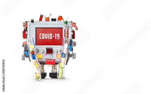 A robotic research computer doctor with alert message COVID 19 on red screen, test tubes with drugs and pills. White background. copy space