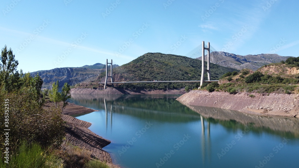 bridge over a lake in león, spain (drone aerial shot)