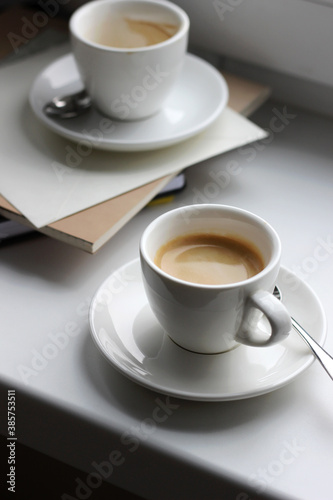 Two Cups of Fresh Cups of Espresso Served on White. Coffee Refreshment.