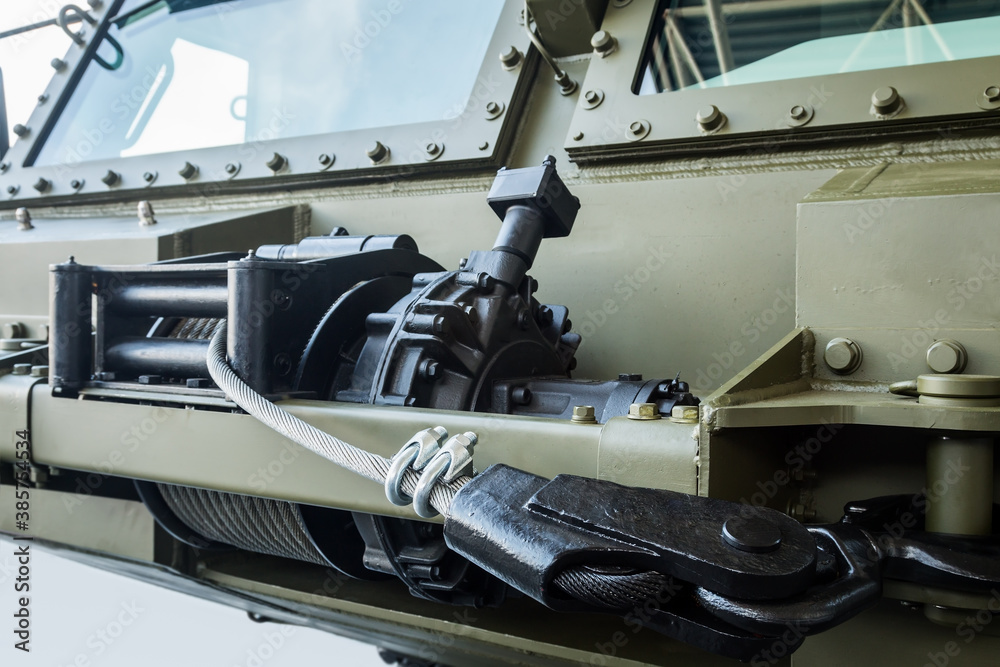 winch with a cable for self-healing is installed on military equipment or tractors