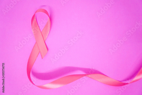 Pink cancer awareness ribbon concept