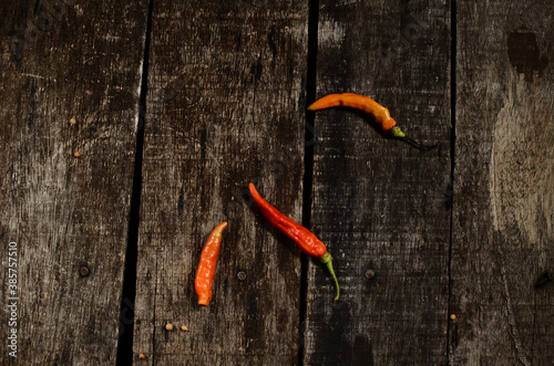 red chilies on a wooden table