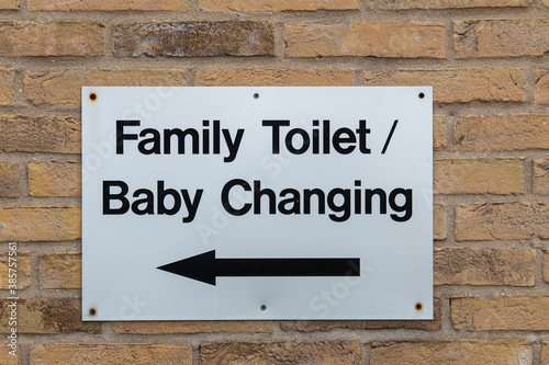 sign telling you family toilet and baby changing