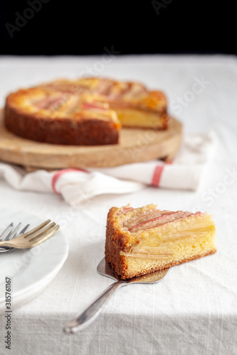 Wallpaper Mural A slice of a rhubarb and custard pie on white table cloth Torontodigital.ca