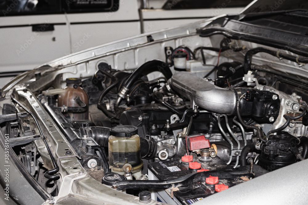 custom made wallpaper toronto digitalThe mechanic is checking the engine.