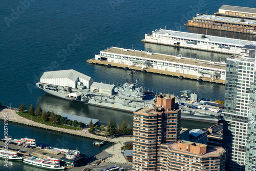 New York, NY / United States - Oct. 14, 2020: a an aerial closeup of Intrepid Sea, Air & Space Museum at Pier 86 at 46th Street, along the Hudson River, in the Hell's Kitchen neighborhood in Manhattan