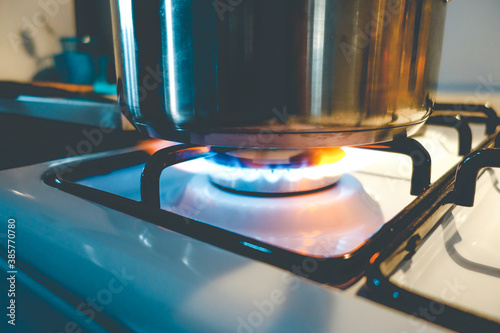 Cooking pan on gas stove closeup view