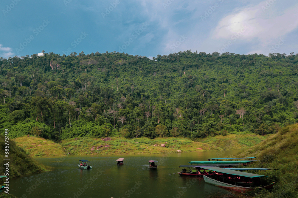 Passenger boats for tourism are parked in the river Passenger boats for tourism are parked in the river