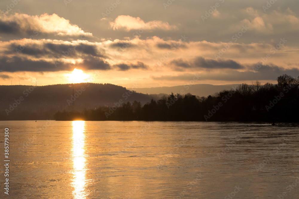 golden sun set over river