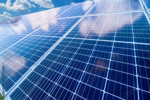 the panel solar, with reflection of clouds and the sky
