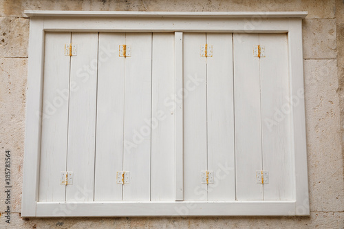 Vintage white window on a wall.