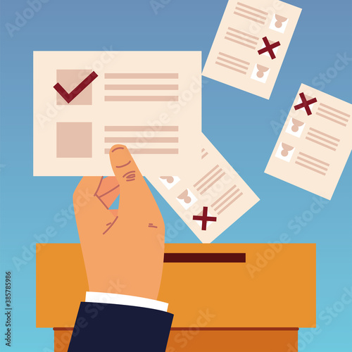 election day, hand holding ballot and papers in box