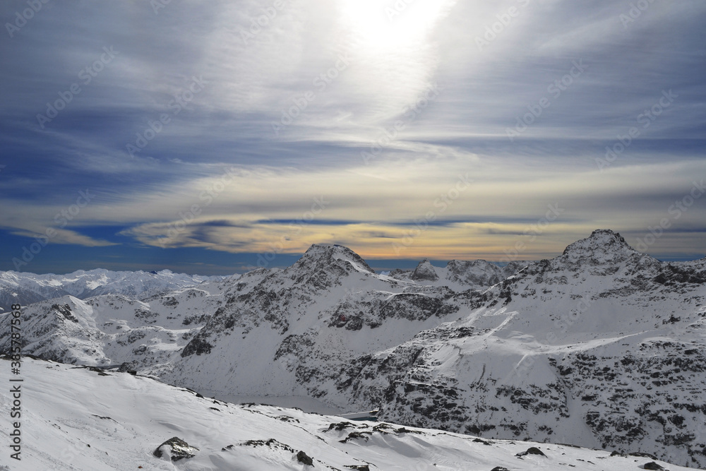 Morning in the winter mountains of the Alps with a picturesque panorama