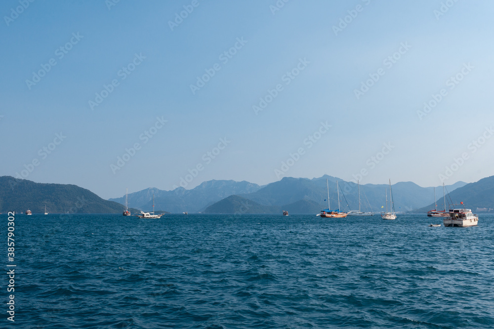 Yachts, boats and sailboats floating in the Bay Yachts, boats and sailboats floating in the Bay