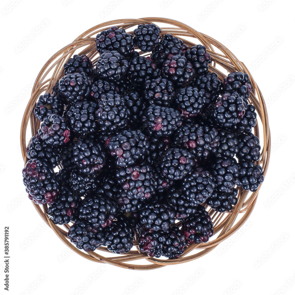 Ripe sweet black blackberries in wooden bowl Ripe sweet black blackberries in wooden bowl