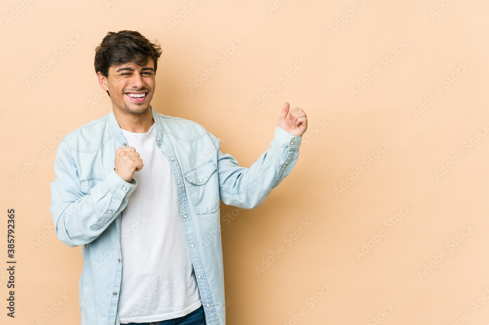 Young cool man dancing and having fun. Young cool man dancing and having fun.